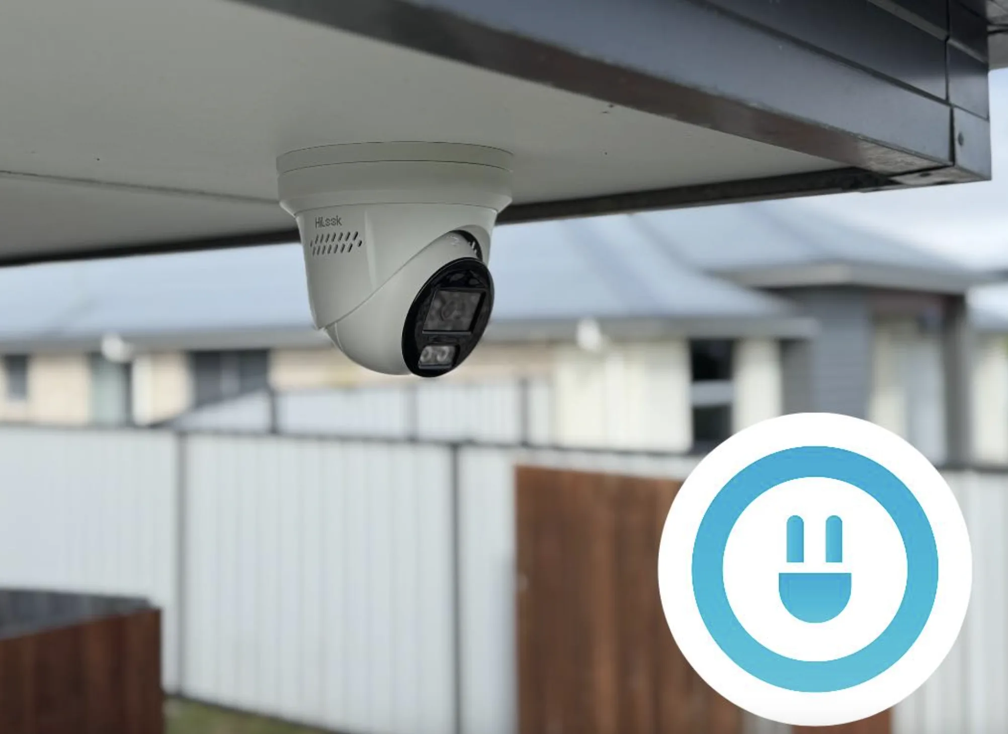 Our Sparky electrician installing CCTV security cameras on a Hervey Bay home